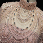 Luxury pink formal evening gown with crystal beading and flowing silhouette