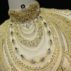 Gold embellished kaftan gown with cascading beadwork for formal events