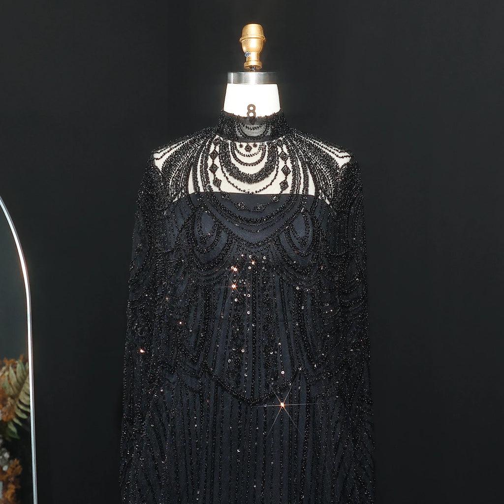 Black crystal beaded kaftan evening gown with flowing cape silhouette