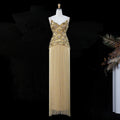 Gold formal evening gown with heavy beading and floor-length fringe skirt