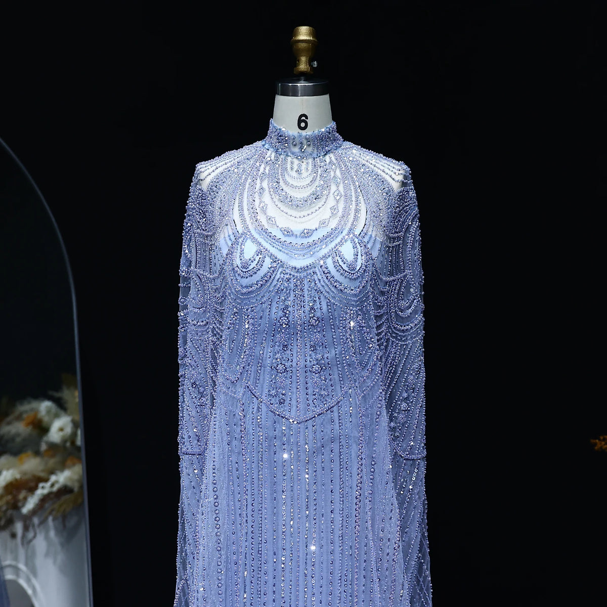 Blue crystal beaded kaftan evening gown with flowing cape silhouette